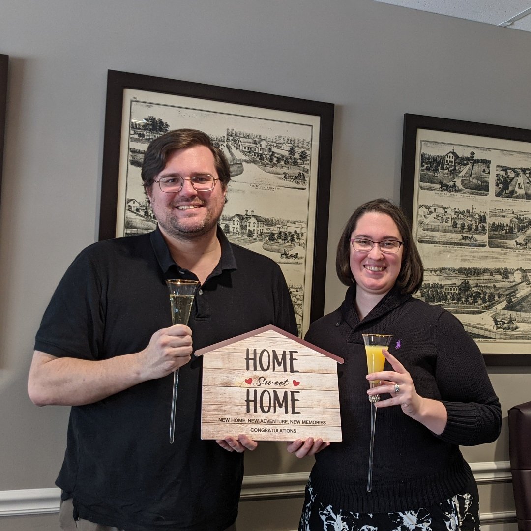 couple celebrating purchase of a new home