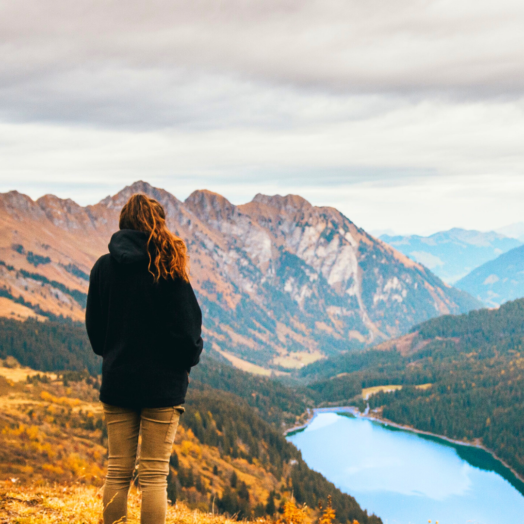 woman overlooking a mountain view