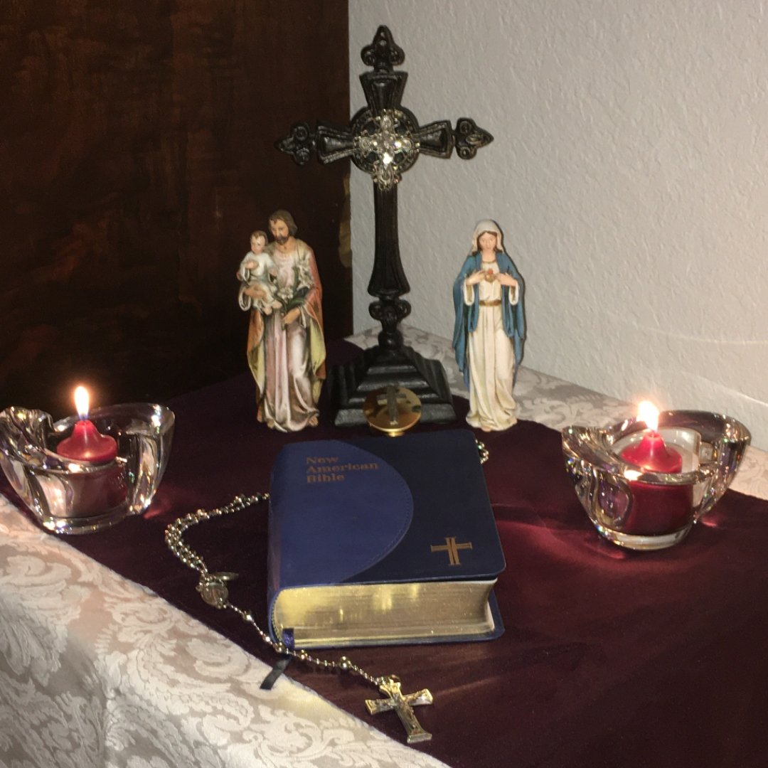 Lenten Home Altar with candles, statues, Bible, cross, and Rosary