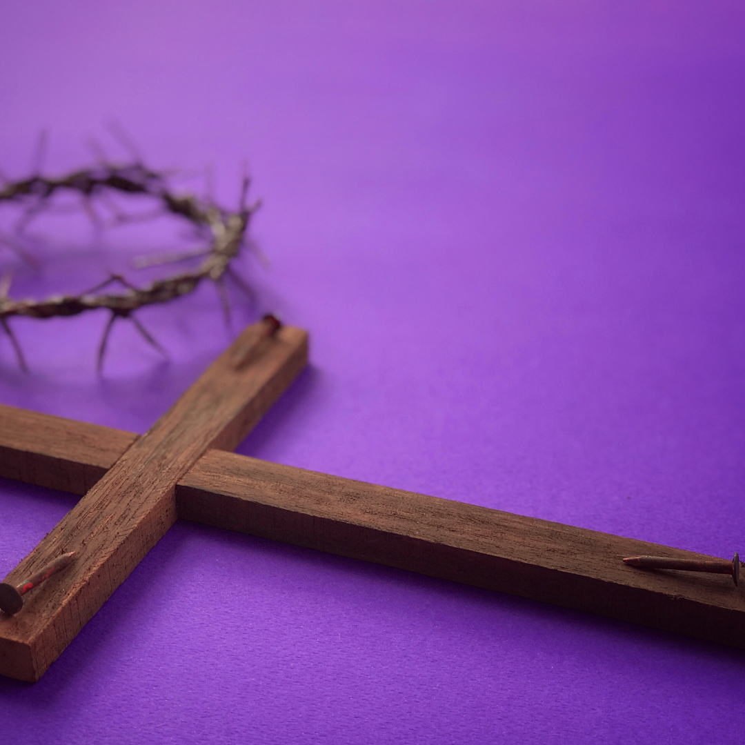 crown of thorns and a cross with 3 nails on a purple background
