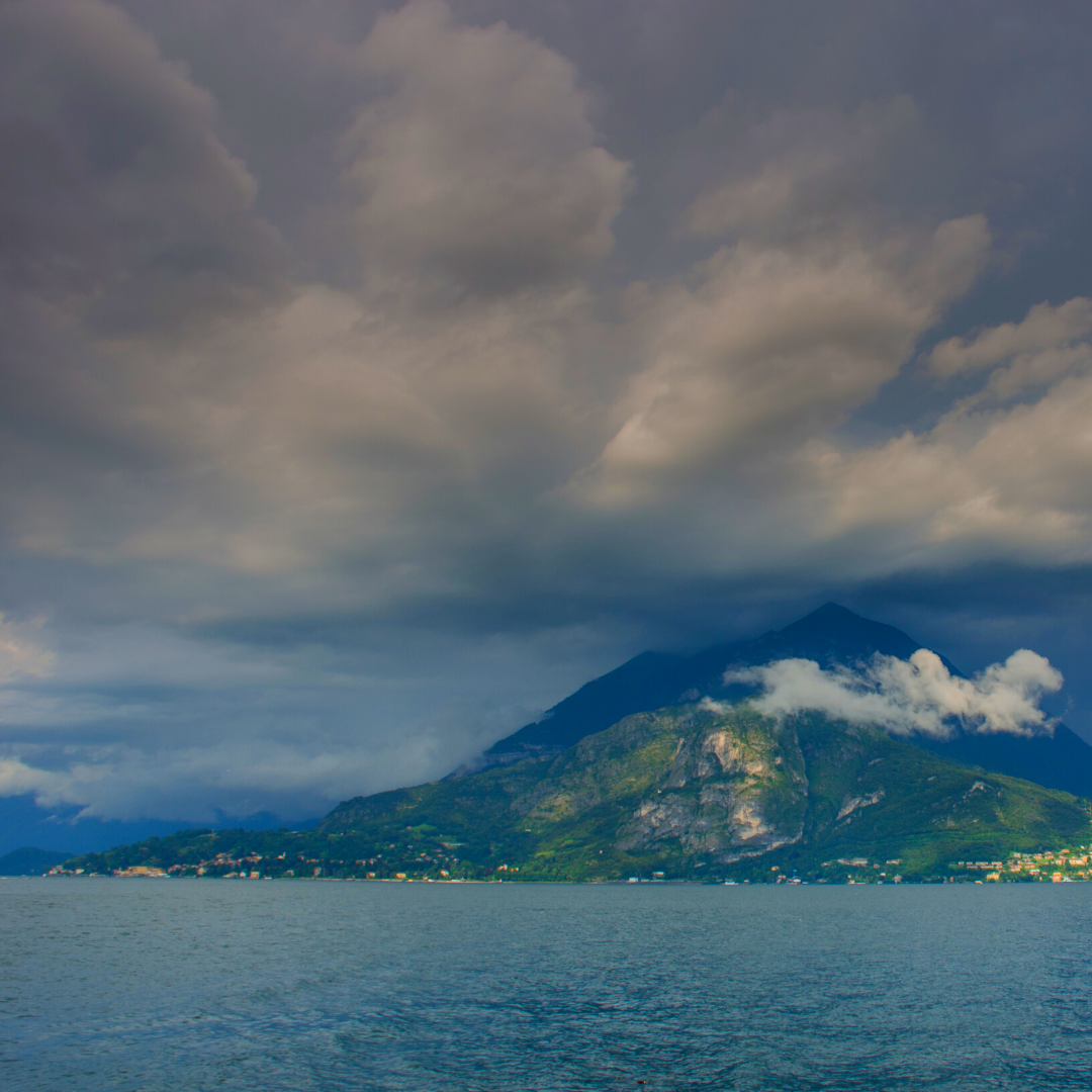 storm over the water with island in the background