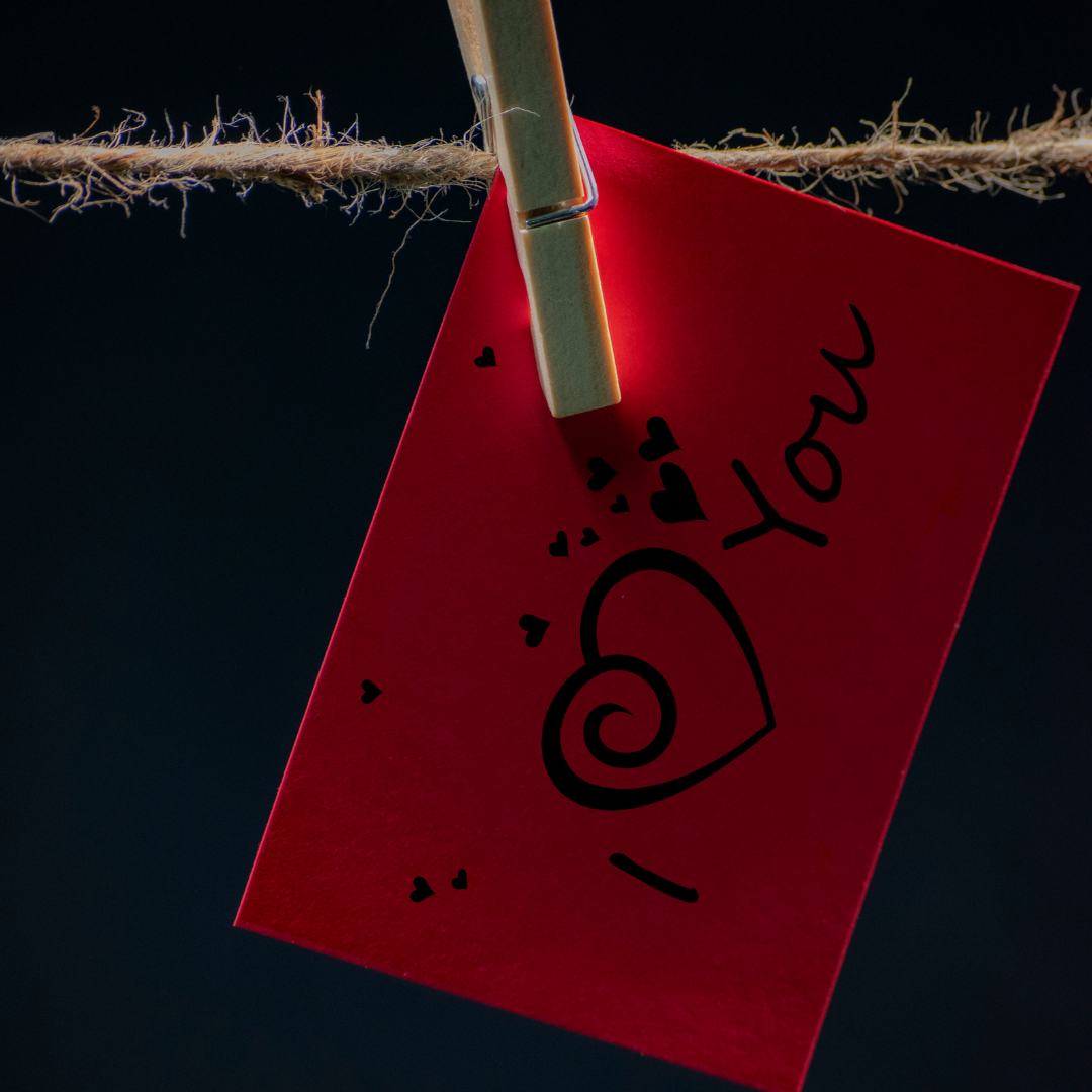 love note hanging by a clothespin