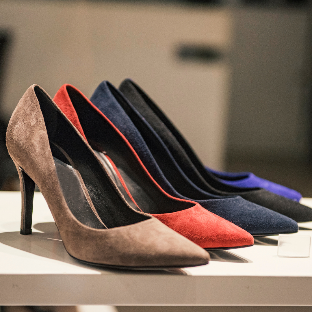women's suede shoes on display in a store