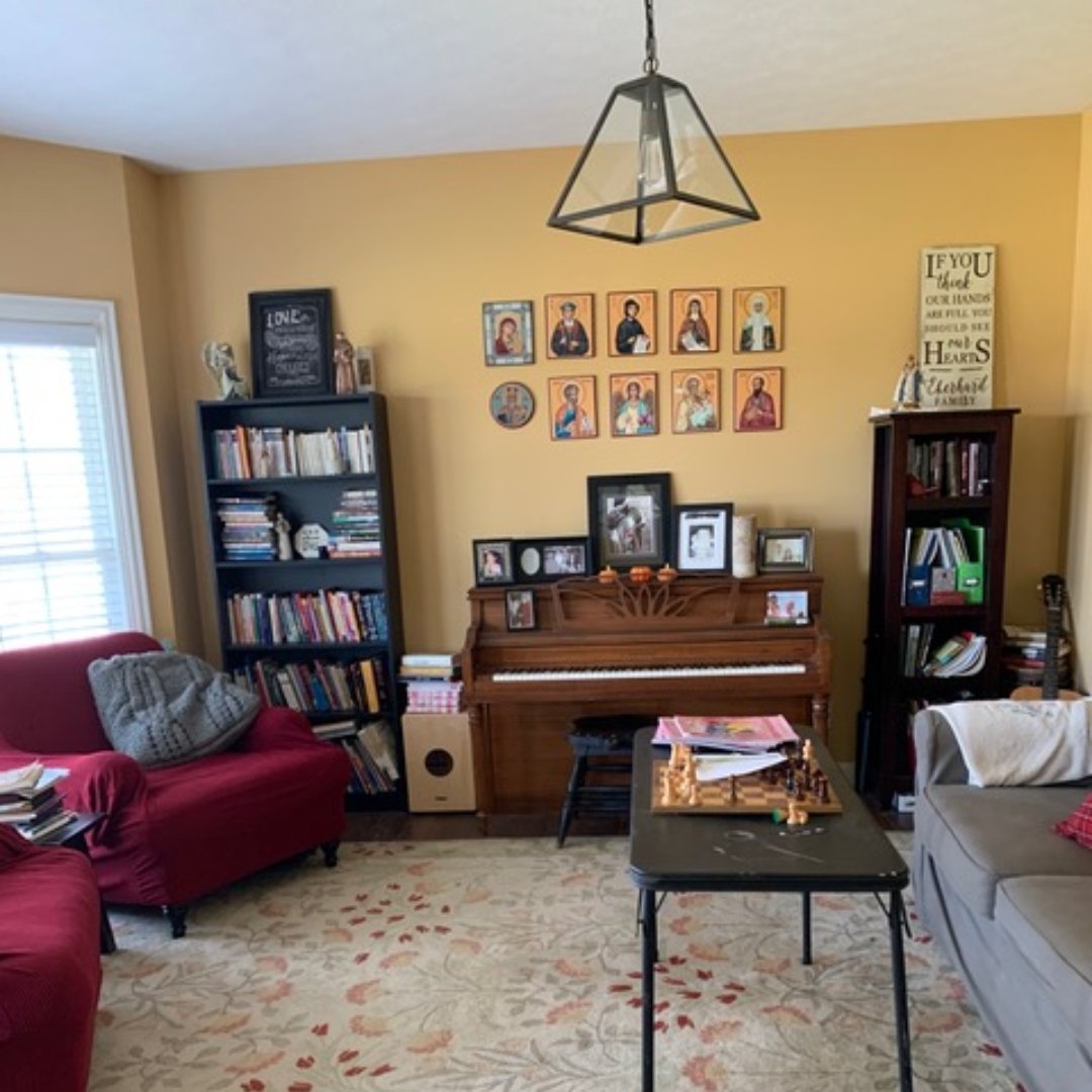 home interior featuring icon wall and religious statues