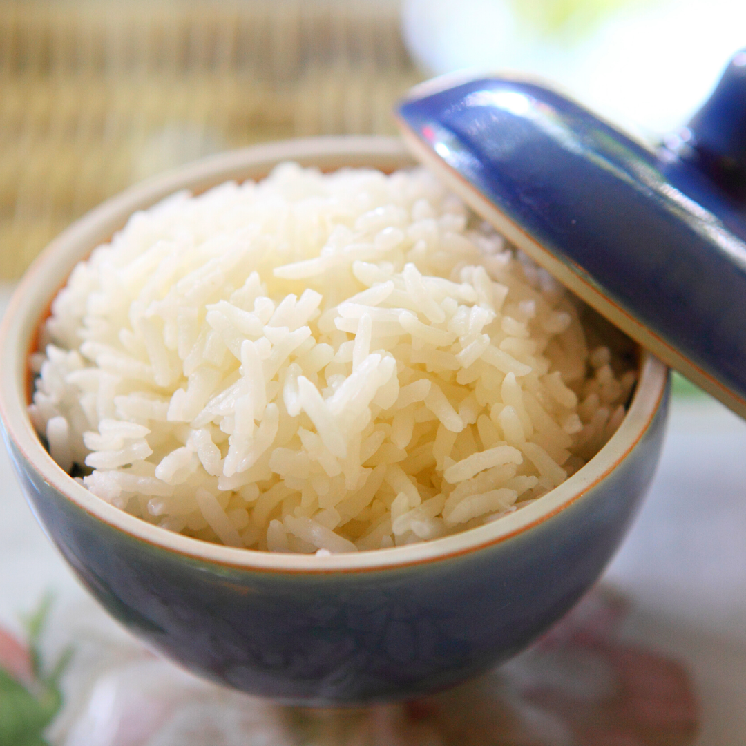 bowl of plain rice with ceramic cover