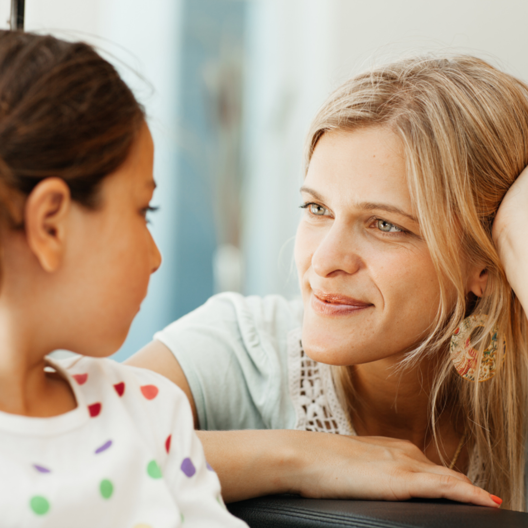 mom listening to little girl
