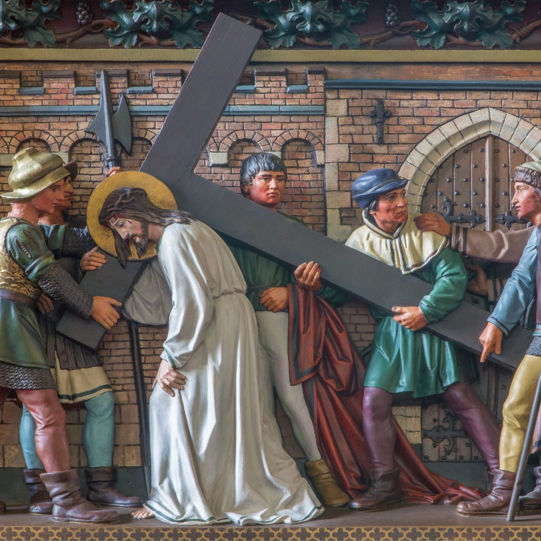 Simon helping Jesus carry the cross