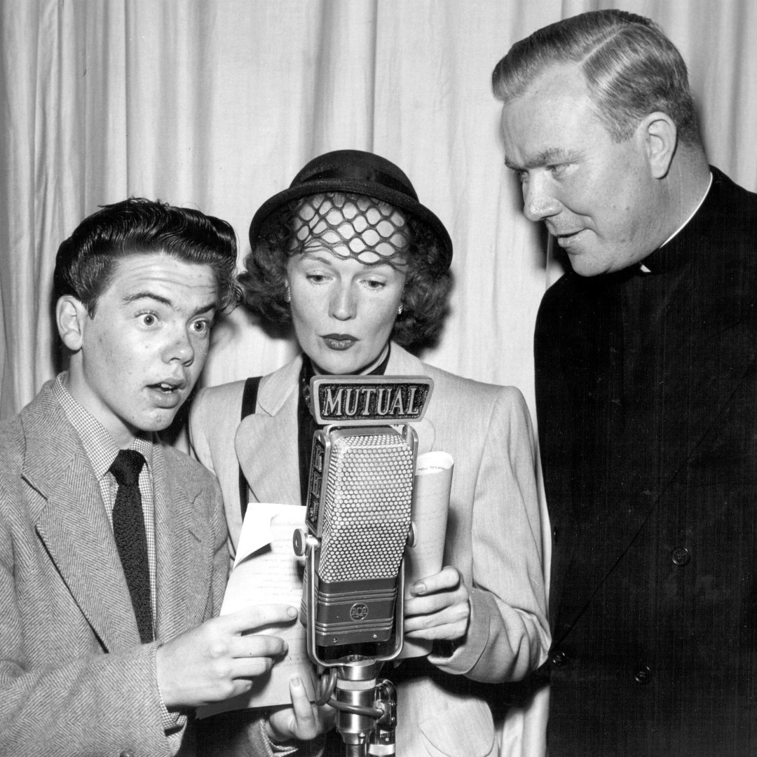 Bobby Driscoll, Rita Johnson, and Fr. Peyton taping a radio show