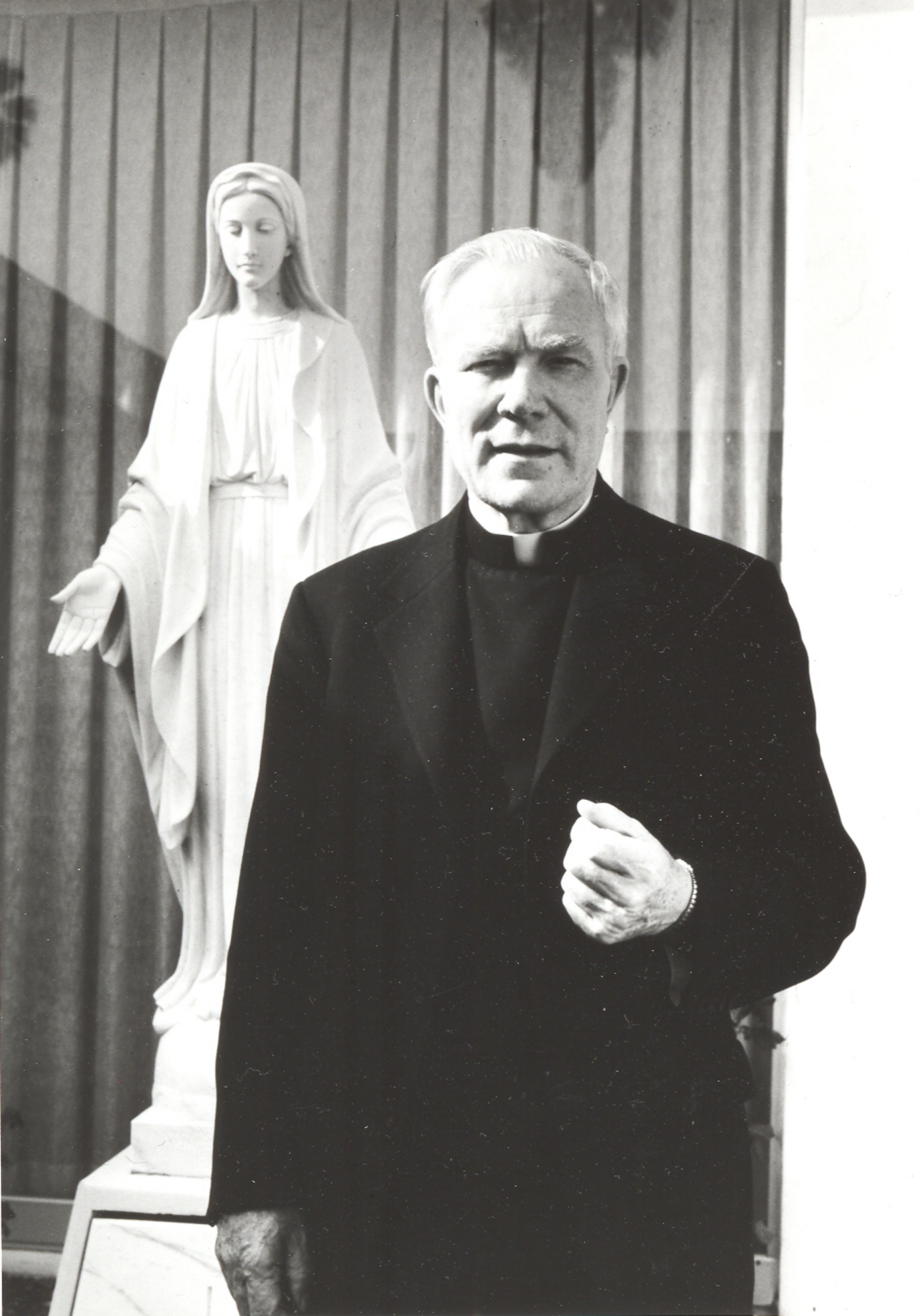 Fr Peyton standing in front of Mary statue-1