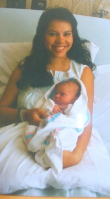 Elena and her first child in 1989