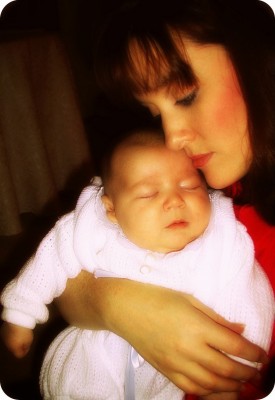 Roxane and child #4, Adam, on his Baptism Day