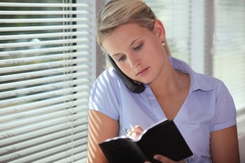 Secretary arranging an appointment