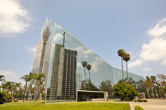 For decades, the Crystal Cathedral stood as a landmark and worldwide center of worship: the largest glass structure in the world comprised of 11,236 glass panels. After filing for bankruptcy, the ministry in 2013 sold the building and adjacent campus to the Roman Catholic Diocese of Orange for its new cathedral. The building now is being renovated to accommodate the Catholic liturgy, formally renamed Christ Cathedral and re-established to serve as the new seat of the Diocese of Orange.