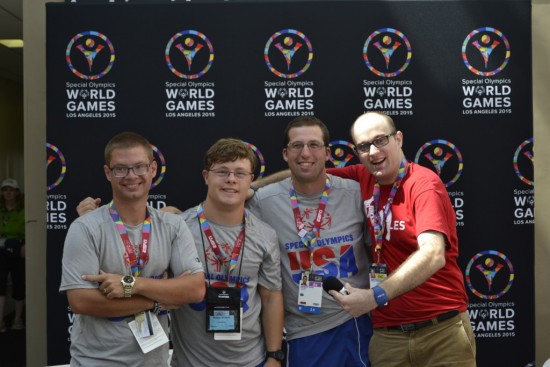 Daniel talks with fellow Special Olympics aquatics athletes from Special Olympics USA. Photo by Daniel Smrokowski/ Special Chronicles