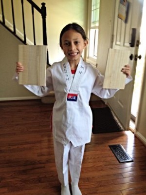 The closest pic I could get to my daughter, who will be fully initiated at the Easter Vigil. So instead of her baptismal garment, she is dressed in her white Tae Kwan Do uniform "breaking the chains of death."