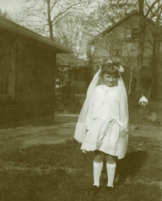 My mom turns 90 this year. This is her First Communion picture from 1933. They didn't have money for a new dress. So this one came from a cousin.