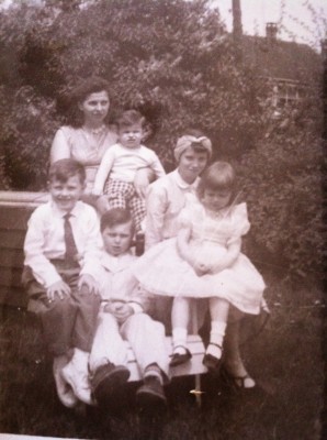 Donna-Marie (in dress on right) with her mother  and 4 of her 7 siblings