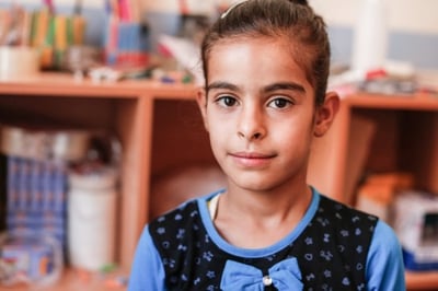 Sakeena, 11, lives in Lebanon's Bekaa Valley with her parents and eight siblings. She attends a yearly summer camp supported by CRS and run by the Congregation of our Lady of Charity of the Good Shepherd Sisters. Photo by Sam Tarling for CRS