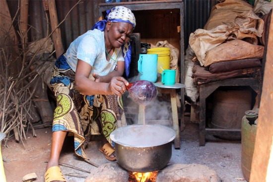 Lucy makes Uji, a type of porridge common in Kenya. Photo copyright 2015 Unbound. All rights reserved.
