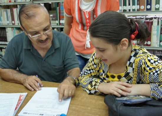 Sami, refugee and volunteer tutor for refugee children at the Pontifical Mission Library in Amman