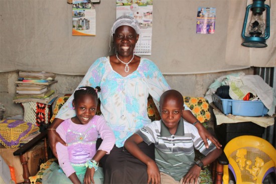 Mary with her children, Veronica and Elijah, who are sponsored through Unbound in Kenya.