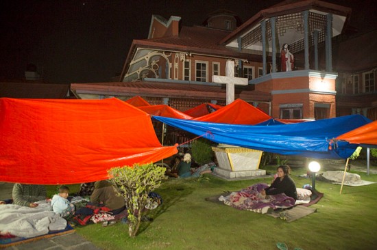 These residents, made homeless by the earthquake, are taking refuge on the grounds of The Church of Our Lady of the Assumption, Patan, Kathmandu, Nepal.  Photo by Jake Lyle for CRS.