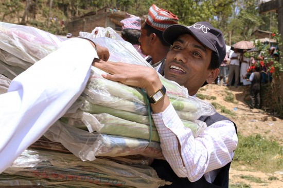 Catholic Relief Services, the Caritas network and Caritas Nepal has rushed tarps, sleeping mats, blankets, hygiene kits and water treatment tablets to families in Gorkha district. CRS reached 502 families during this distribution, or more than 2,500 people.  Jennifer Hardy/CRS