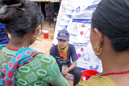 CRS distributes not just supplies, but knowledge.   Photo by Jennifer Ryan/CRS