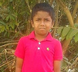 Hopat lives in India, loves to draw and play soccer, and helps his family with chores. 