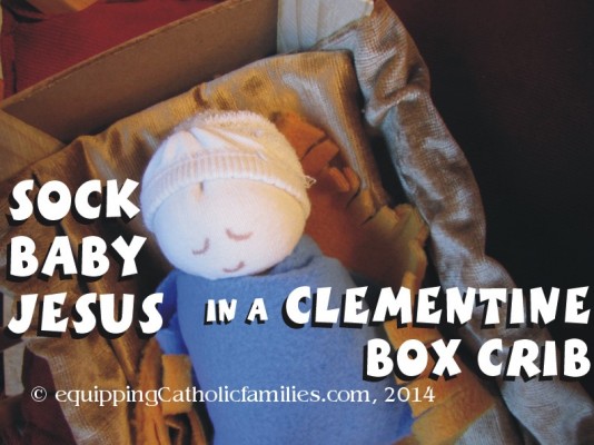 Sock Baby Jesus in a Clementine Crib 2