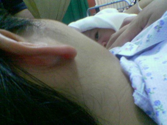 Breastfeeding my eldest right after he was born