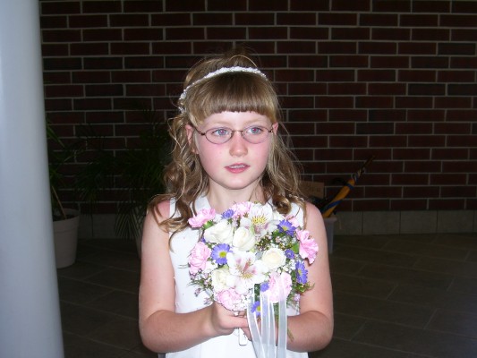 dan first communion with flowers