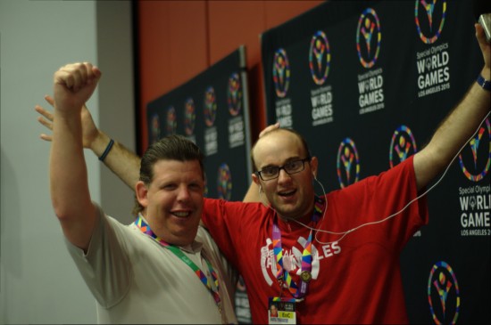 Daniel (right) and Dustin (left) reach up for Special Olympics World Games Los Angeles 2015 after a press conference on July 24. Photo by Daniel Smrokowski/Special Chronicles.