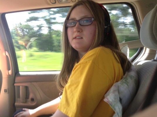 Danielle in the passenger's seat of our van