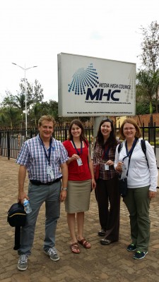 Egan Fellows claim their newly minted press credentials at the Rwandan Media High Council.