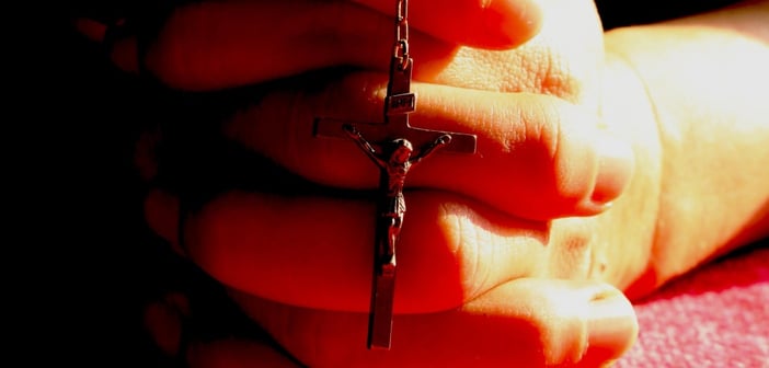 rosary in hand_red, jclk8888, 2013, morgueFile free photo