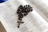 rosary-on-bible-1427670-s