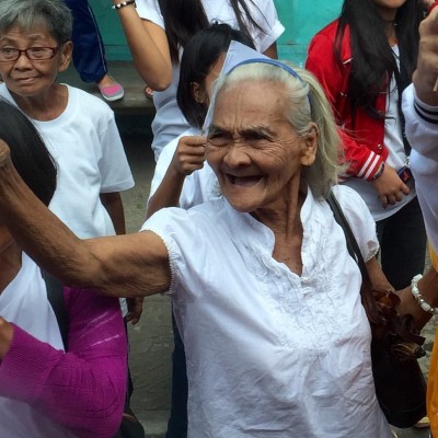 An Unbound Elder friend and participant greets us along the road in Legazpi.