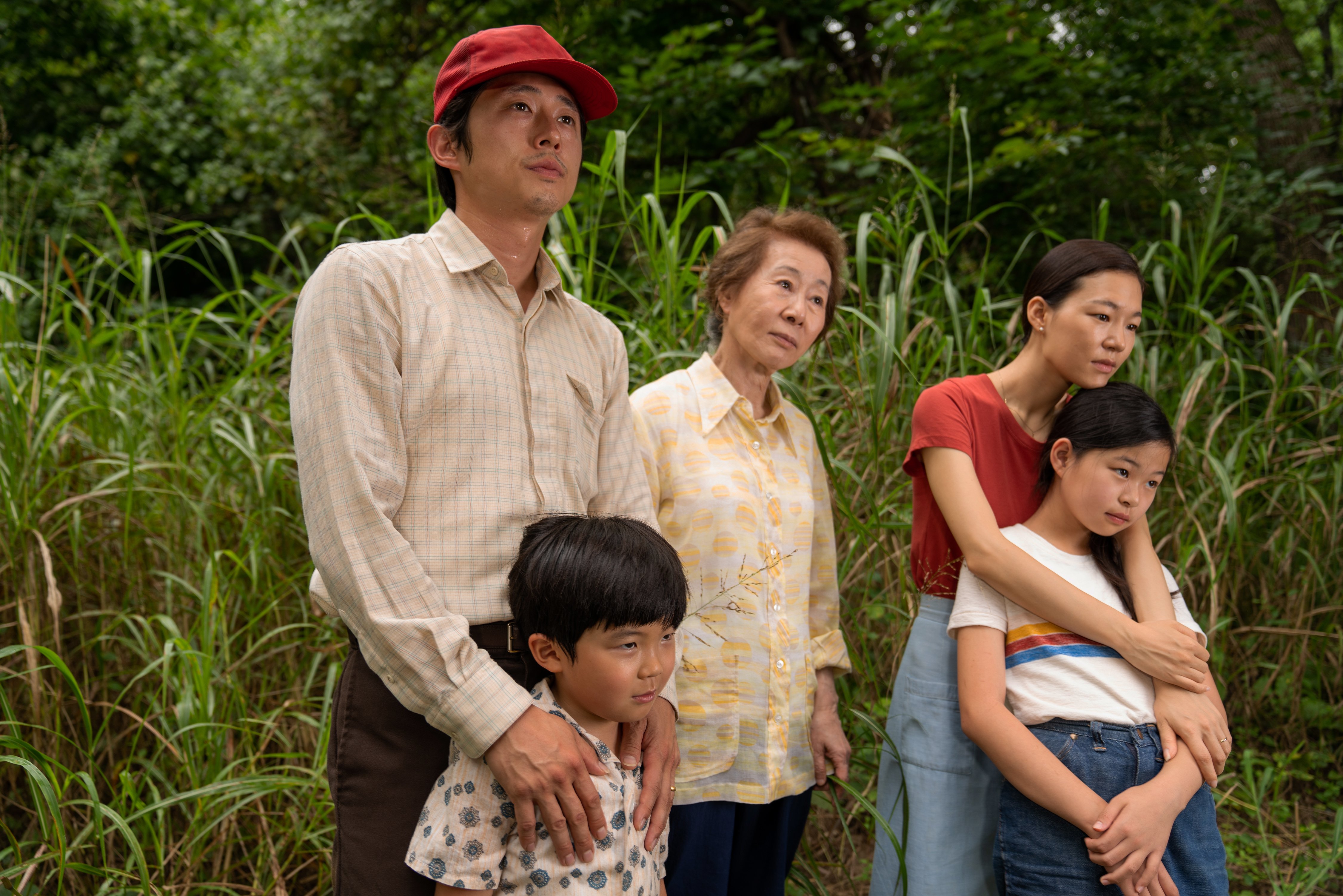 MINARI: Parents, grandmother 2 children standing outside on a farm