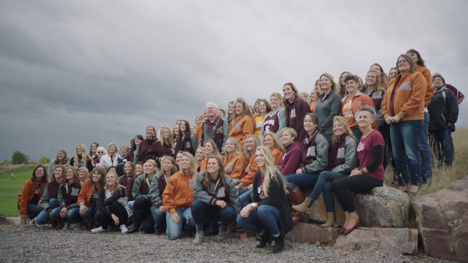 Rob Selvig surrounded by many former Lady Griz players at his retirement/reunion party in 2016