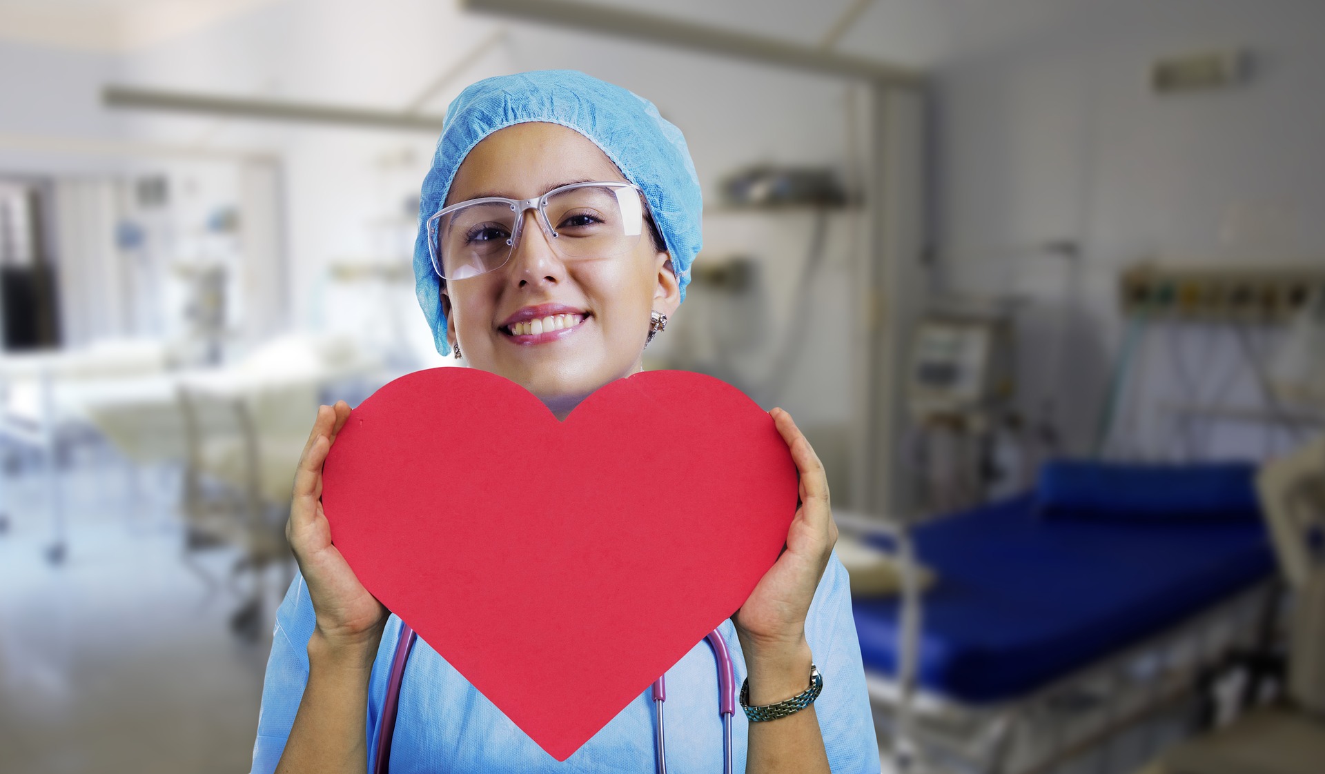 nurse with giant paper heart
