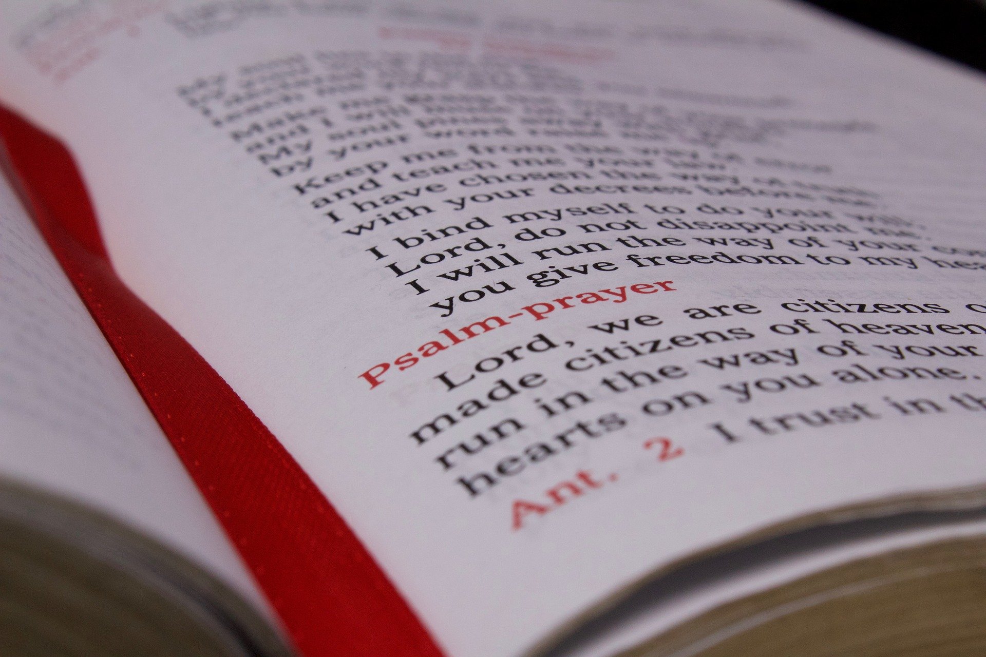 close-up of open breviary with red ribbon