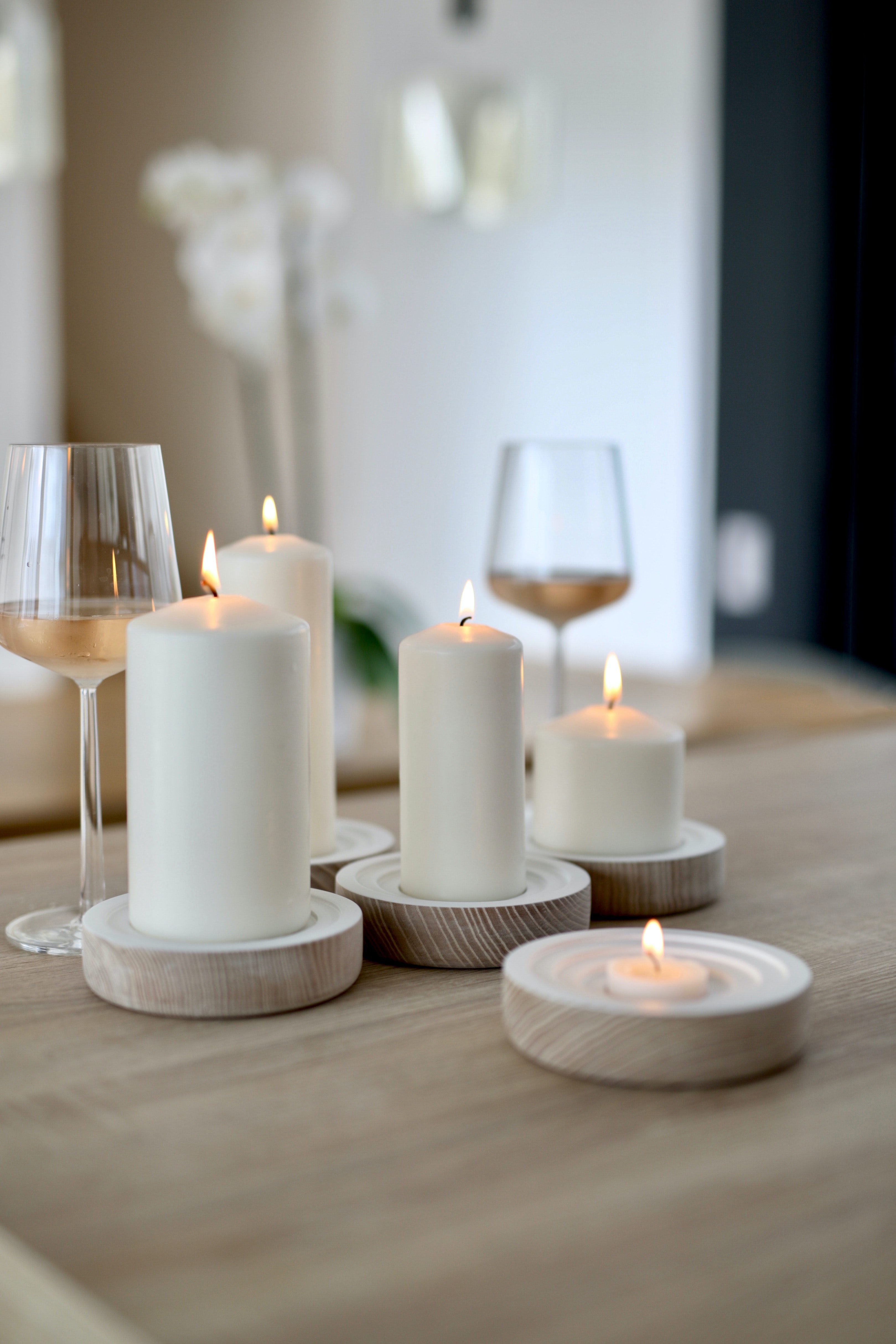 romantic table setting with wine glasses and candles