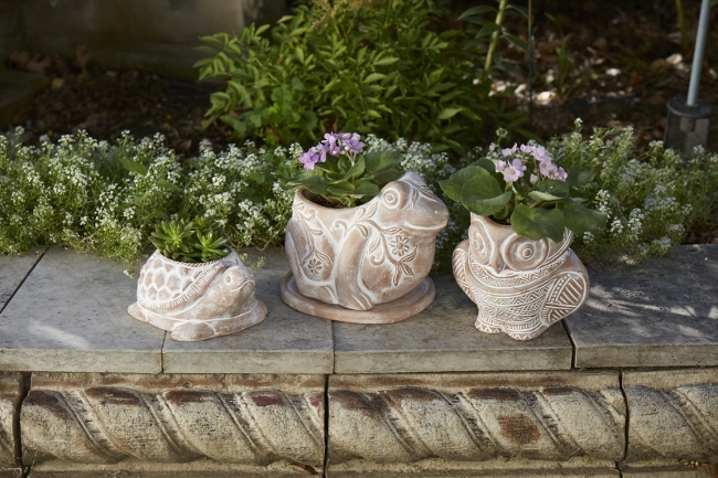 These terra cotta planters are made by hand from supported artisans in Bangladesh.